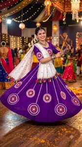 Purple dandiya chaniya choli with white dupatta and tassels